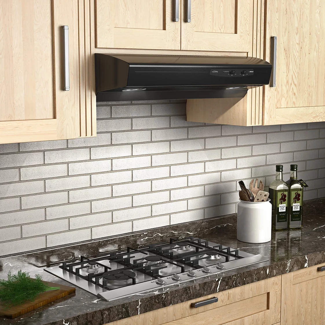 White kitchen range with black hood and tiled backsplash