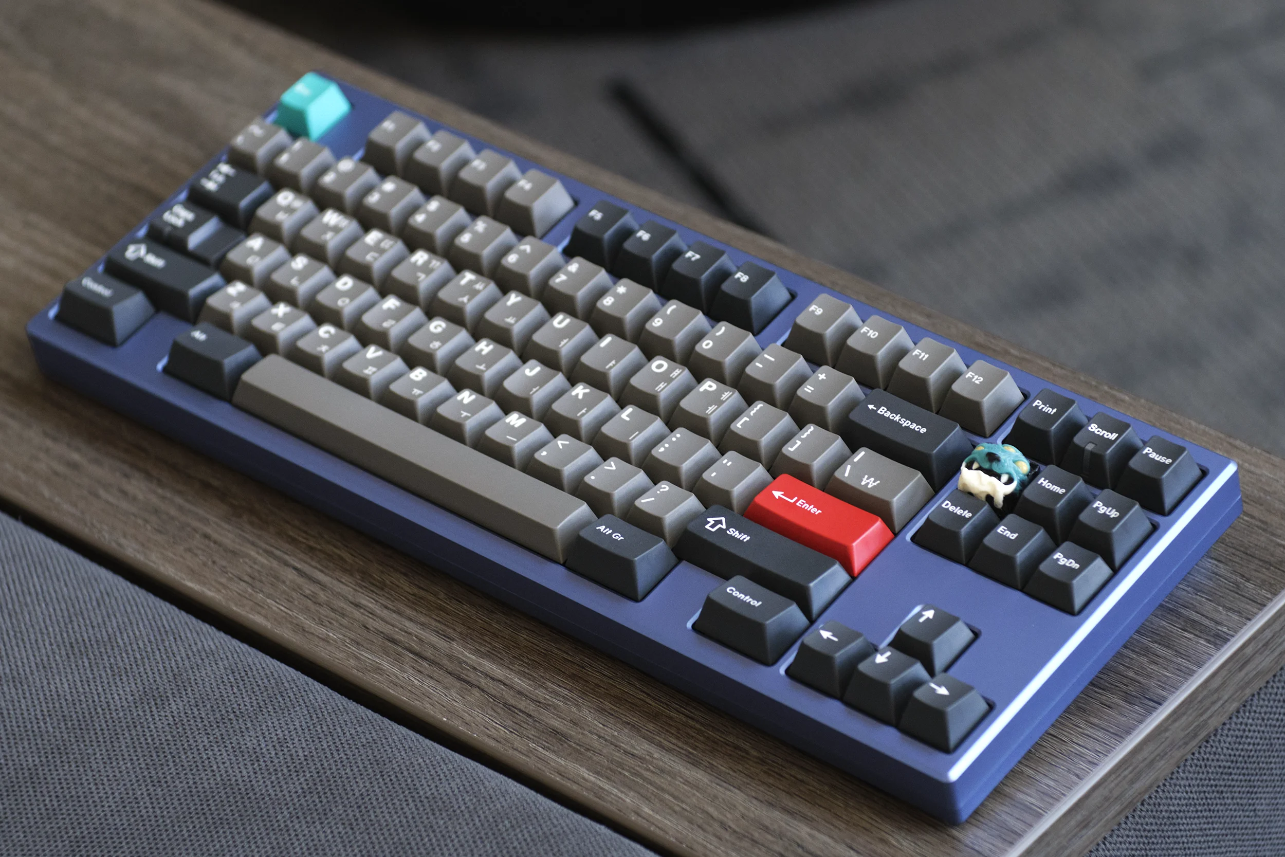 Purple mechanical keyboard with gray and red keycaps